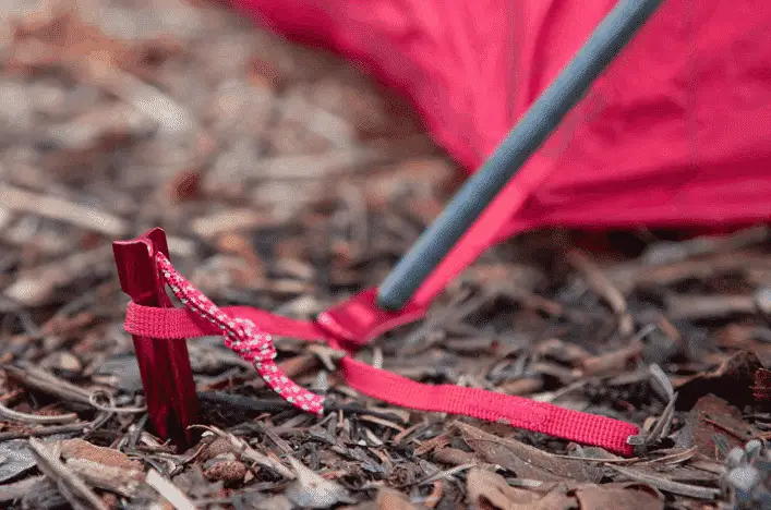 Tighten up your guy lines and tent stakes to stabilize your tent in a thunderstorm.