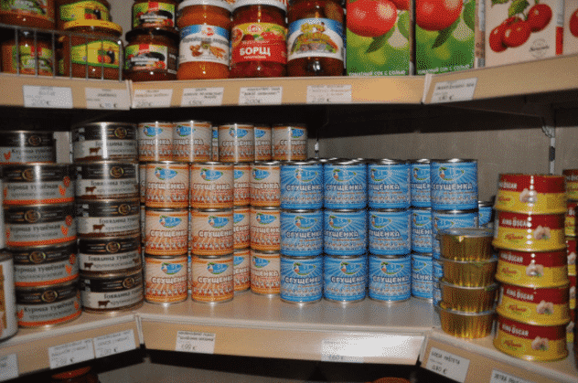 Canned Food On Pantry Shelf