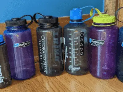 Nalgene water bottles in a row