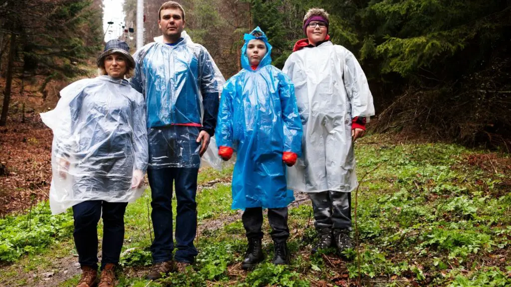 A poncho will increase ventilation instead of wearing rain pants on a hike.