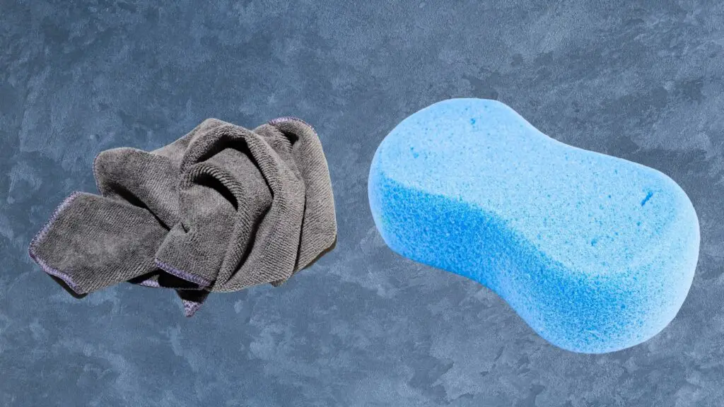 Use a microfiber towel and sponge to dry the inside of your tent and gear when camping in the rain.