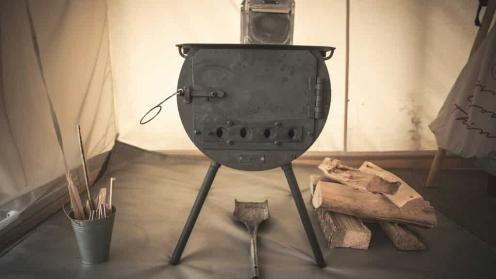 Wood burning heater in a canvas tent